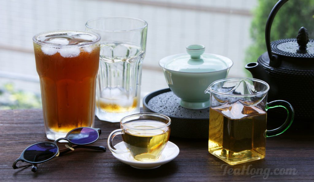 two glasses of ice tea and a gaiwan with freshly brewed tea