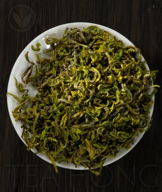 The tiny, twirly, delicate little leaves of Mo Gan Yellow Snails yellow tea